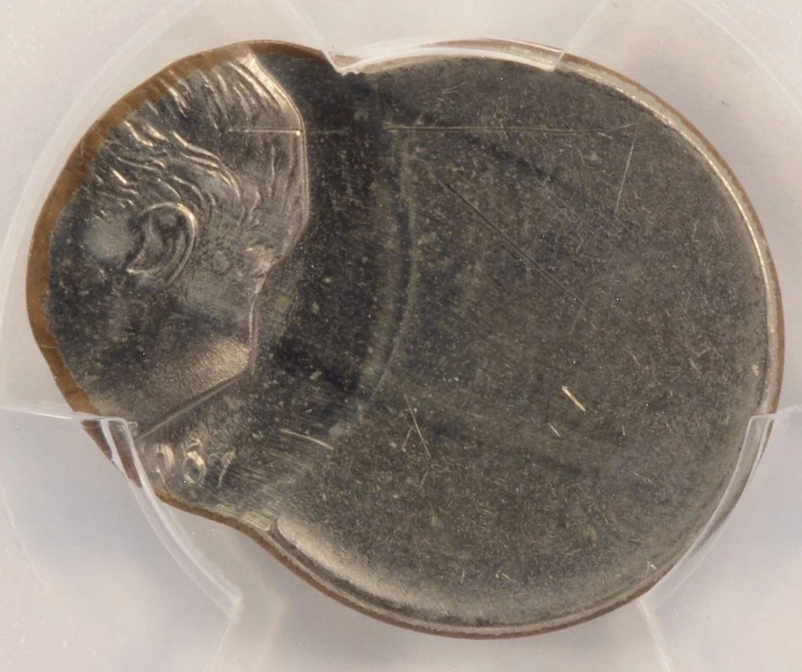 1967 Roosevelt dime off-center strike showing design shifted to one side with blank crescent area visible